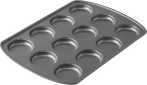 Wilton Gold Premium Non-Stick Warp-Resistant Bakeware, Made without PFAs, Muffin Top Pan, 12-cavity, 11×16 in, Packaging May Vary Wilton Gold Premium Non-Stick Warp-Resistant Bakeware, Made without PFAs, Muffin Top Pan, 12-cavity, 11×16 in, Packaging May Vary